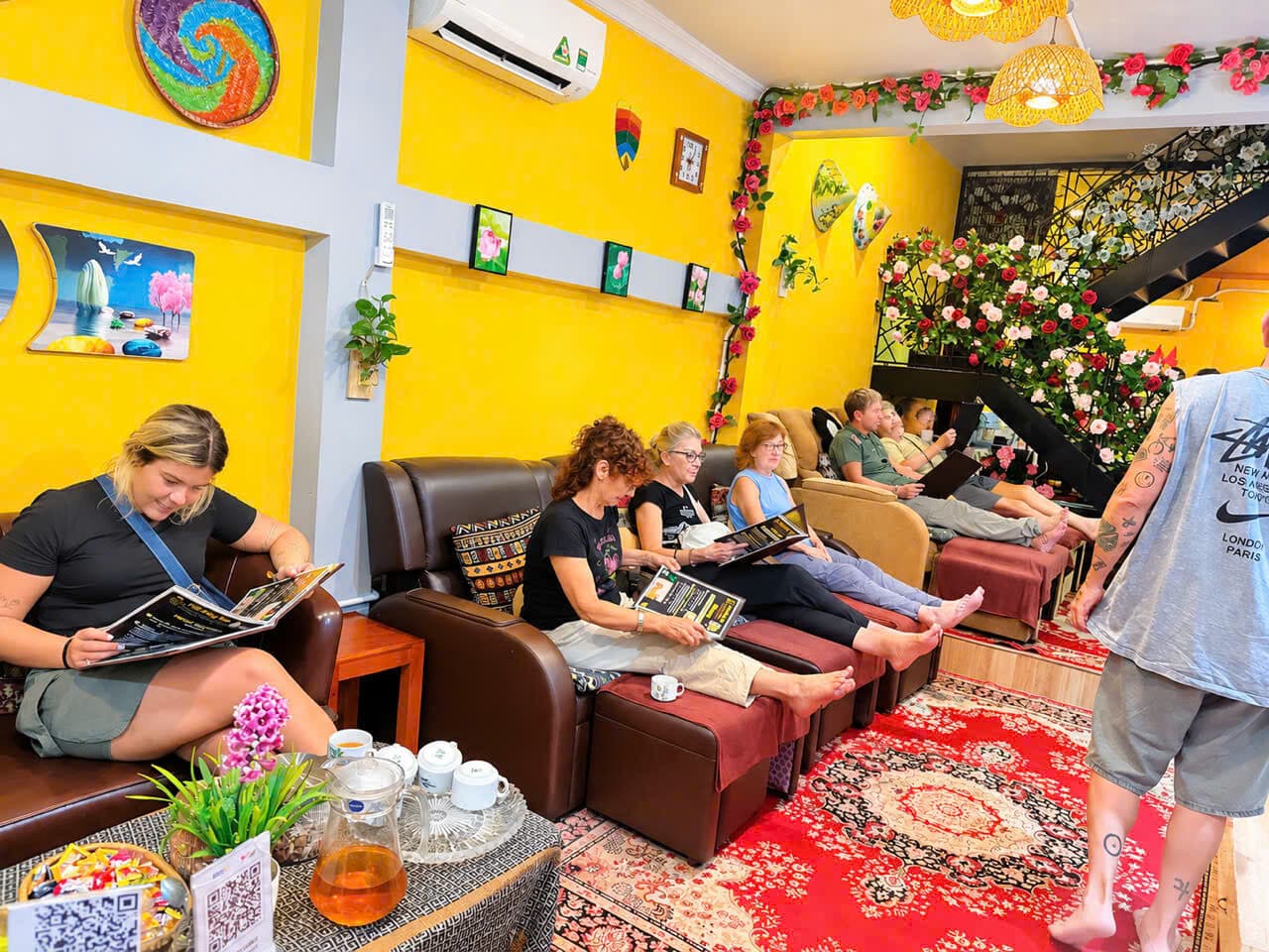 Travellers relaxing in the Tran Hang Spa lounge